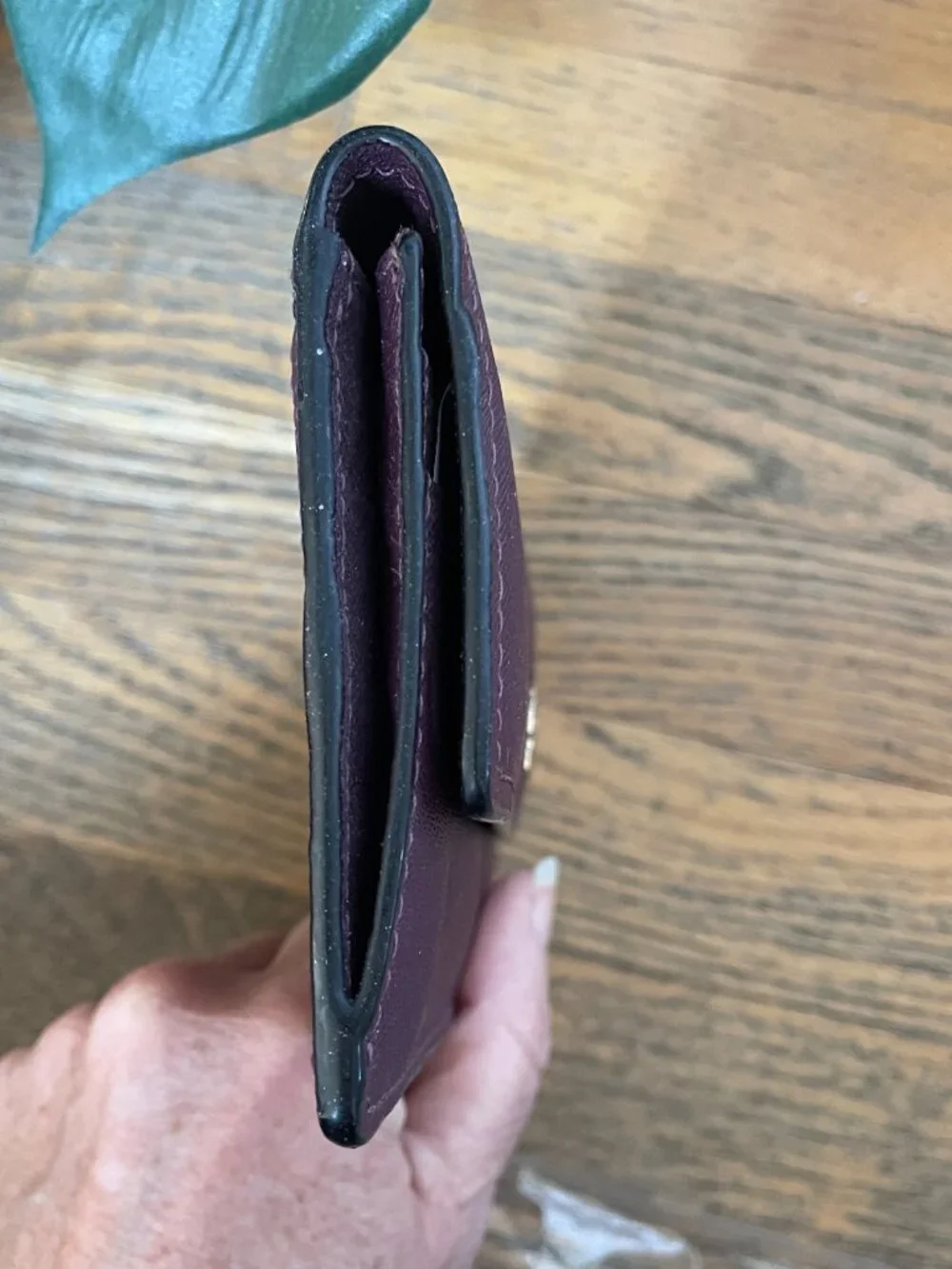 Kate Spade Large bi- Fold wallet in Deep Plum